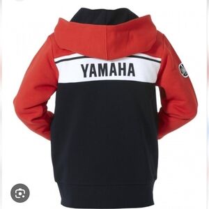 Yamaha zip-up hoodie features a distinctive tricolor design with a red upper sec